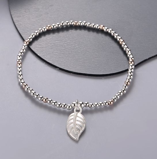 leaf-pendant-on-stretchy-bracelet-silver-rosegold