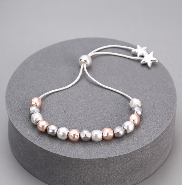 mixed-toned-balls-on-pullcord-bracelet-with-star-ends-silver-rosegold