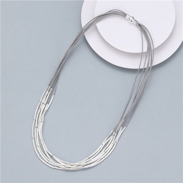 multitiered-curved-discs-on-corded-magnetic-necklace-silver